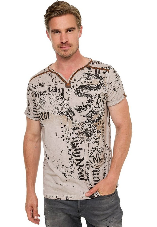 Rusty Neal T-Shirt mit Allover-Druck von Rusty Neal