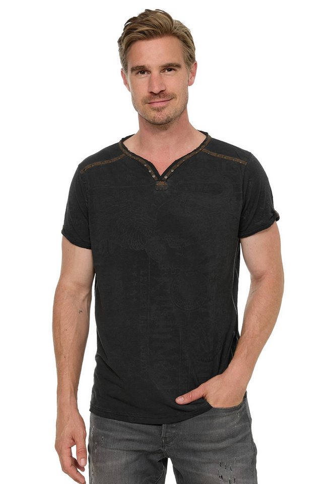 Rusty Neal T-Shirt mit Allover-Druck von Rusty Neal