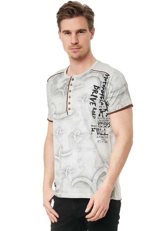 Rusty Neal T-Shirt mit modernem Print von Rusty Neal