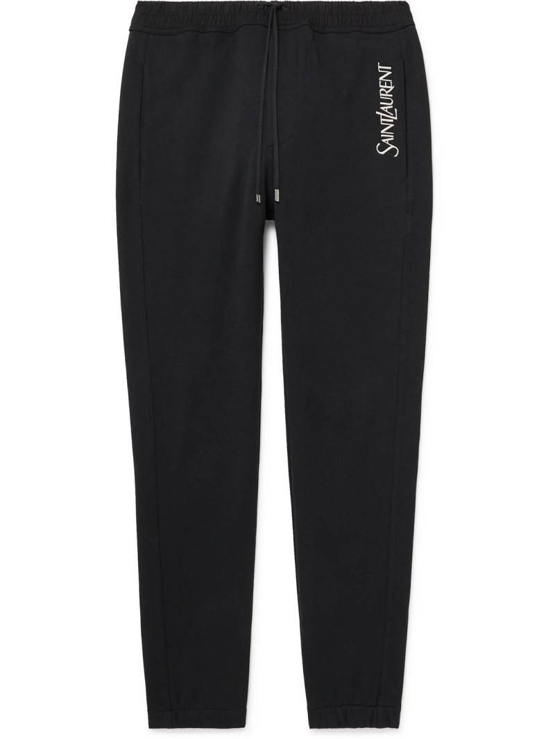 SAINT LAURENT - Tapered Logo-Embroidered Cotton-Jersey Sweatpants - Men - Black - M von SAINT LAURENT