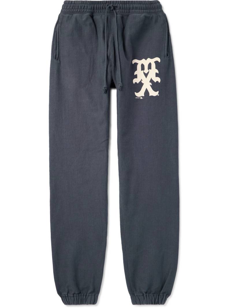 SAINT MXXXXXX - Tapered Logo-Print Cotton-Blend Jersey Sweatpants - Men - Blue - L von SAINT MXXXXXX