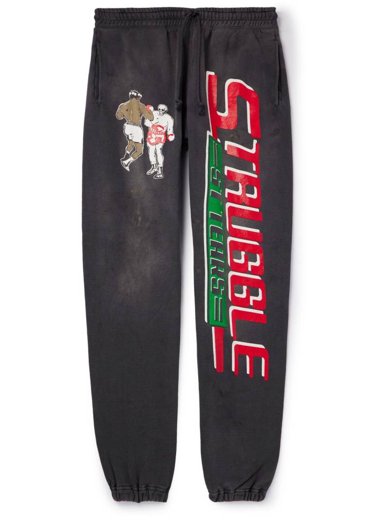 SAINT MXXXXXX - Denim Tears Tapered Distressed Printed Cotton-Jersey Sweatpants - Men - Black - M von SAINT MXXXXXX