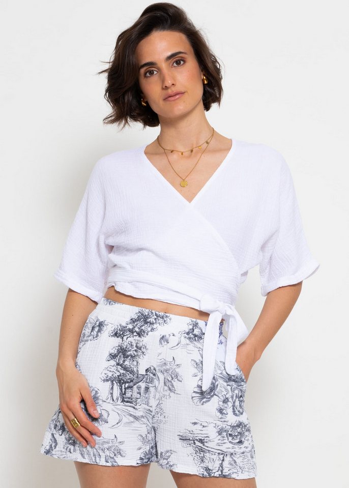 SASSYCLASSY Wickelbluse Musselin Bluse mit Bindeband und lockerer Passform Kurzarm Wickelbluse aus Baumwolle SASSYCLASSY Wickelbluse Musselin Bluse mit Bindeband und lockerer Passform Kurzarm Wickelbluse aus Baumwolle von SASSYCLASSY