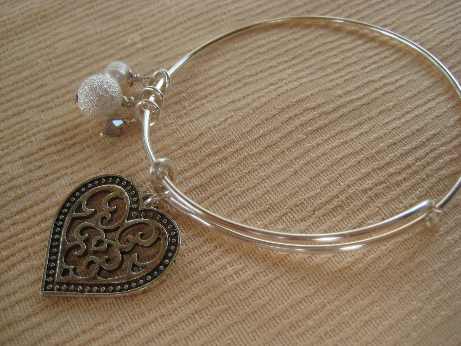 Einstellbare Silber Herz-Armband Mit Einer Süßwasser-Perle Einstellbare Silber Herz-Armband Mit Einer Süßwasser-Perle von SBEC