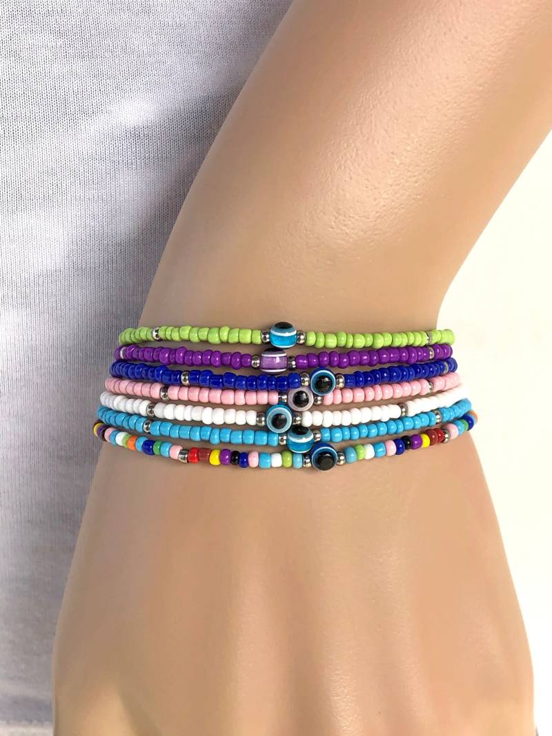 Evil Eye Perlenarmband Winzige Rocailles Perlen Schmuck, Edelstahl Verschluss Evil Eye Perlenarmband Winzige Rocailles Perlen Schmuck, Edelstahl Verschluss von SBOeyes
