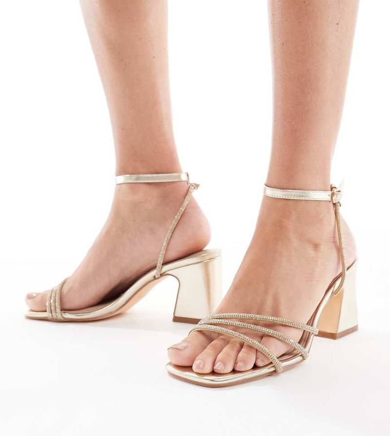 SEQWL Wide Fit - Leal - Goldfarbene Riemchen-Sandaletten mit Blockabsatz und Verzierung, weite Passform von SEQWL Wide Fit