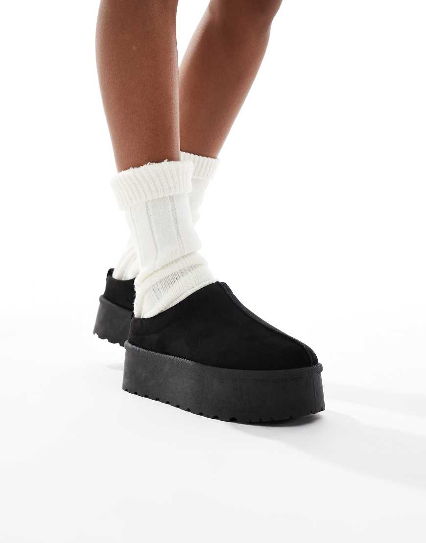 SEQWL - Mules in Schwarz zum Hineinschlüpfen mit flacher Plateausohle von SEQWL