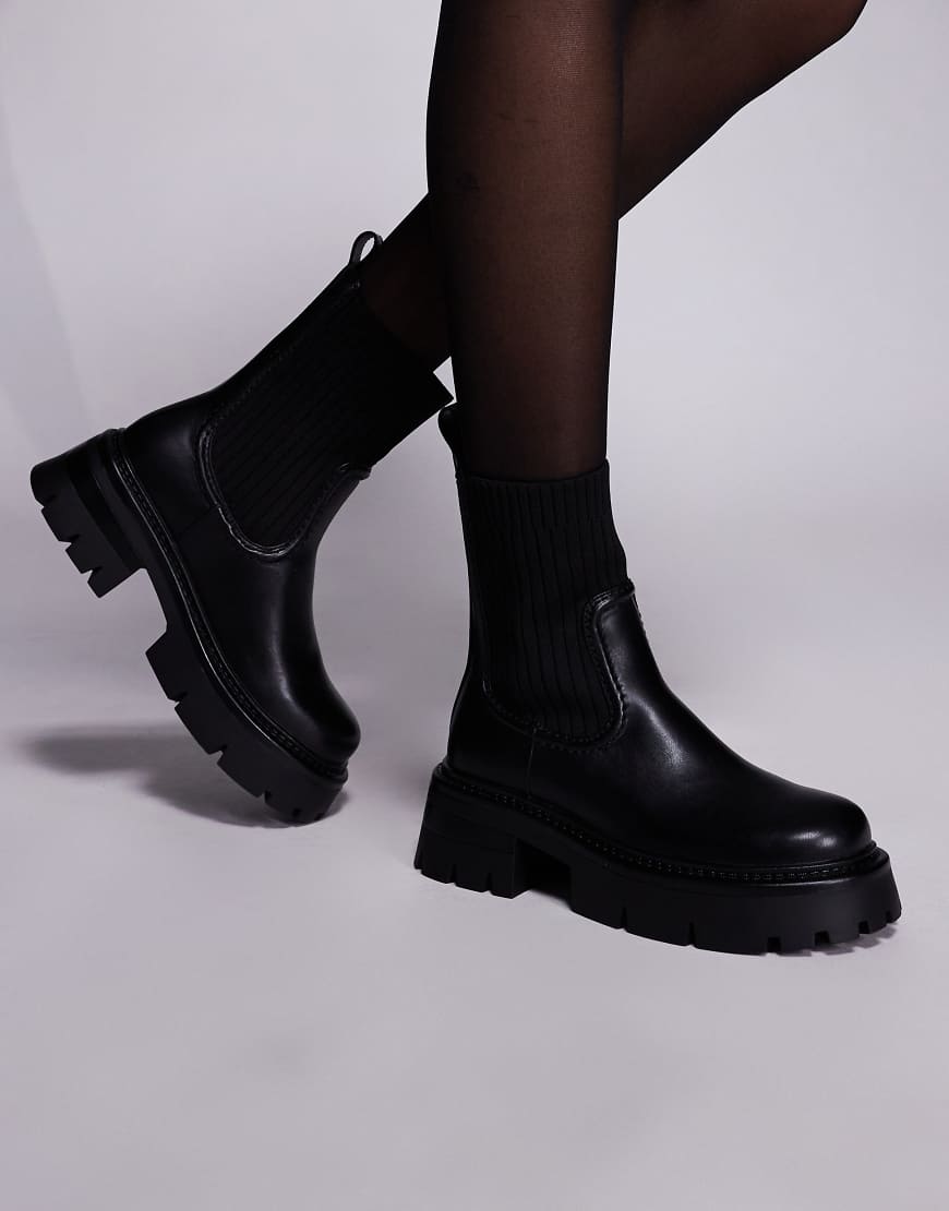 Simmi London - Paulie - Ankle-Boots in Schwarz mit dicker Sohle und niedrigem Absatz Simmi London - Paulie - Ankle-Boots in Schwarz mit dicker Sohle und niedrigem Absatz von SIMMI Shoes