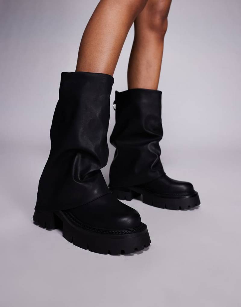 Simmi London - Wiz - Ankle-Boots in Schwarz mit dicker Sohle und niedrigem Absatz Simmi London - Wiz - Ankle-Boots in Schwarz mit dicker Sohle und niedrigem Absatz von SIMMI Shoes