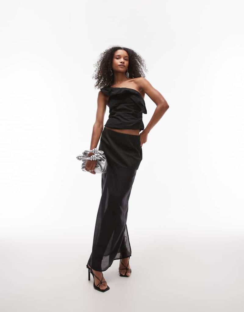 SNDYS - Leicht transparenter Maxirock in Schwarz mit Schlitz vorne von SNDYS