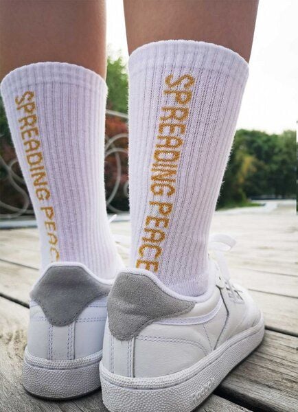 SPARKLES OF LIGHT SPREADING PEACE Unisex Sportsocken aus Biobaumwolle von SPARKLES OF LIGHT