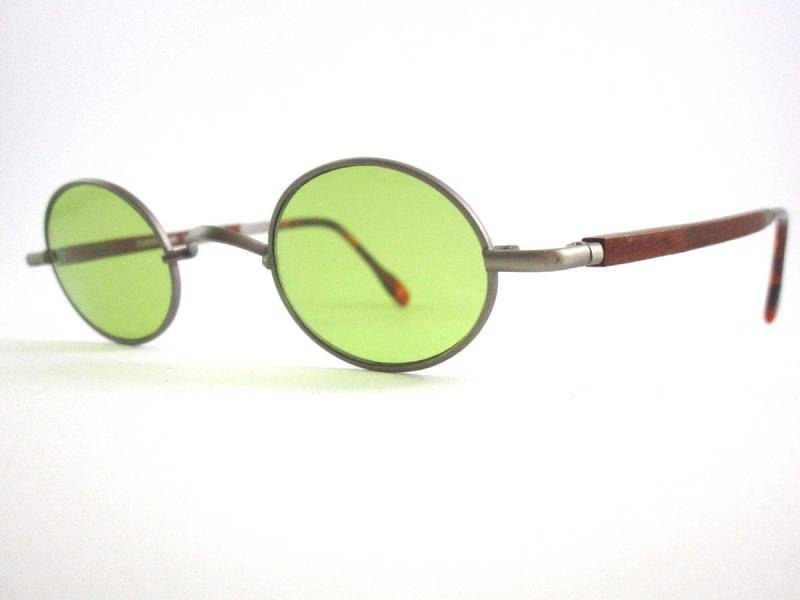 Essence Sonnenbrille Aus Holz Mod.068 Col.792 Essence Sonnenbrille Aus Holz Mod.068 Col.792 von STILOTTICAITALIANA