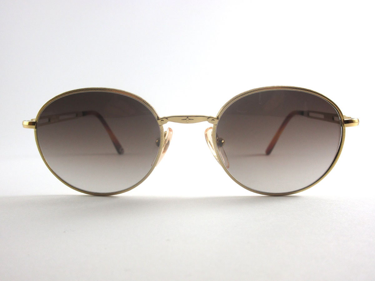 Swing 561 Vintage Sonnenbrille Made in Italy Farbe Gold Panthos von STILOTTICAITALIANA