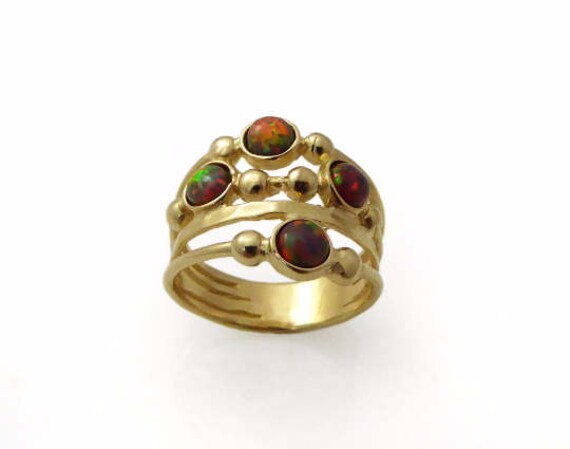 Goldener Opalring. Feueropal-Goldring. Breiter Ring. Goldring. Wellengoldring. Wellenopalring Goldener Opalring. Feueropal-Goldring. Breiter Ring. Goldring. Wellengoldring. Wellenopalring von STarLighTstudiO3