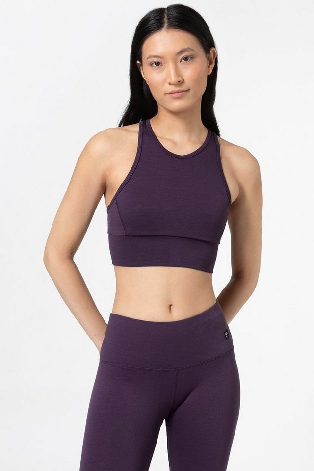 SUPER.NATURAL Sporttop für Damen aus Merino W LIQUID FLOW TOP mit hoch geschnittenem Ausschnitt von SUPER.NATURAL