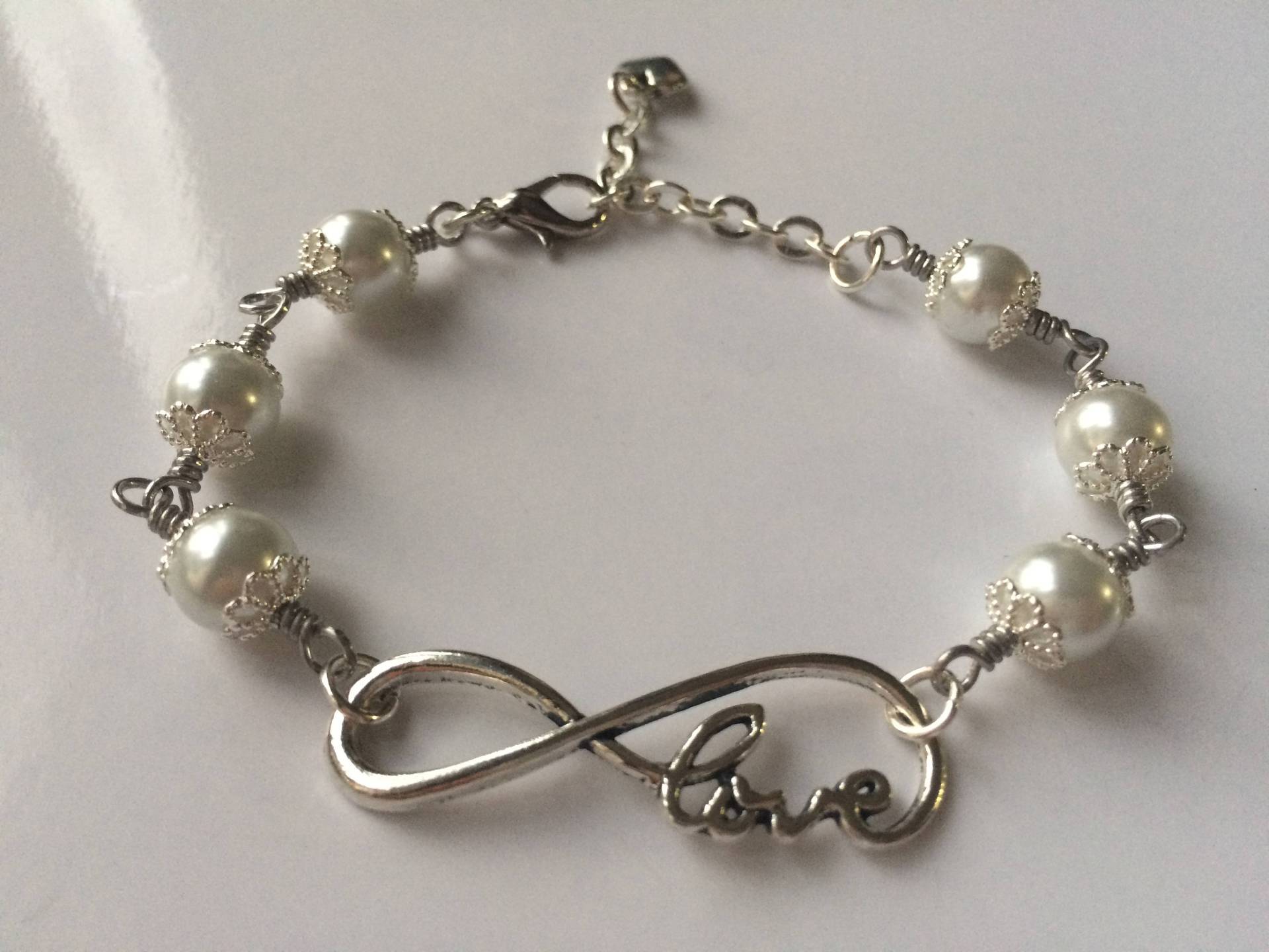 Perlenarmband Unendlich Liebe Perlenarmband Unendlich Liebe von SacredRegalia