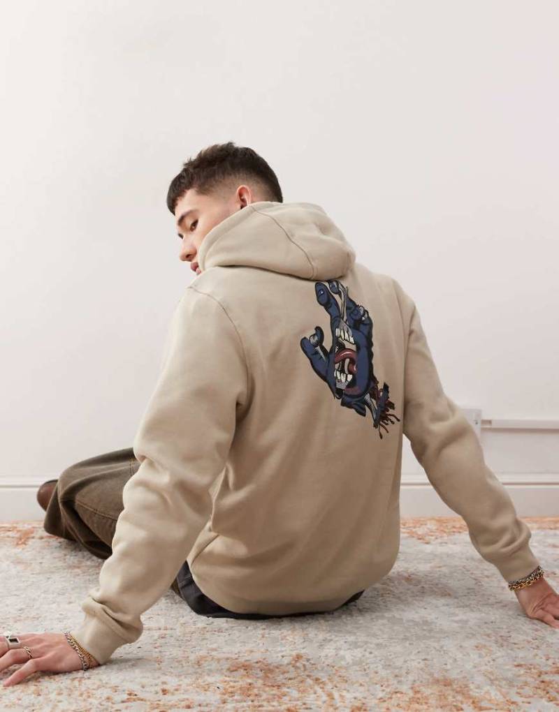 Santa Cruz - Kapuzenpullover in Beige mit aufgesticktem Logo auf der Brust und Print auf dem Rücken-Grau von Santa Cruz
