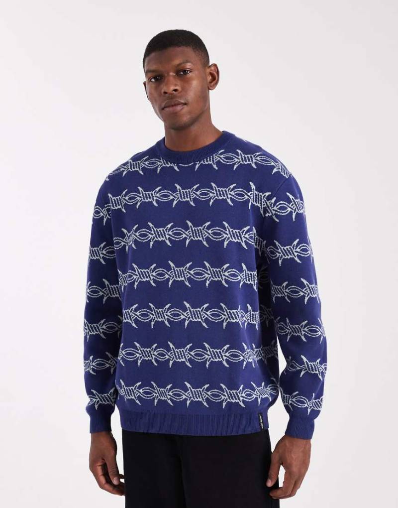 Santa Cruz - Strickpullover in Blau mit Stacheldraht-Monogramm-Motiv von Santa Cruz