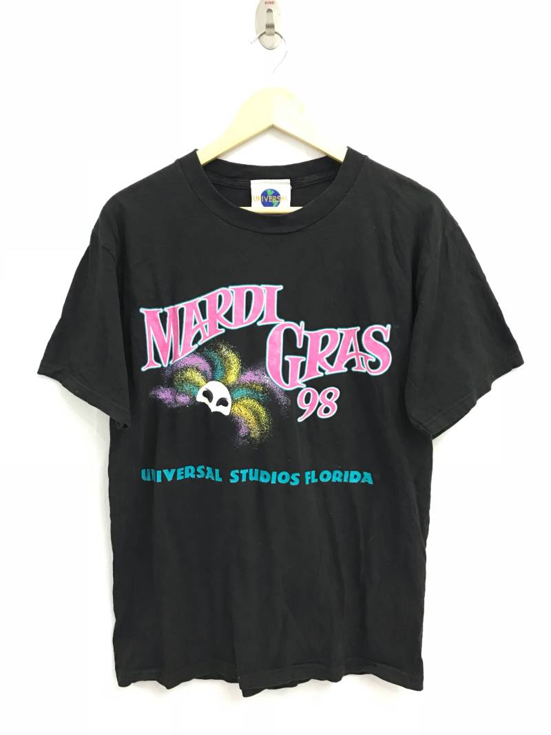 Vintage 90Er Jahre Mardi Gras Tshirt.. Das Phantom Der Oper.. Universal Studios Florida.. Größe M.. Hergestellt in Den Usa Vintage 90Er Jahre Mardi Gras Tshirt.. Das Phantom Der Oper.. Universal Studios Florida.. Größe M.. Hergestellt in Den Usa von SawTheBundle