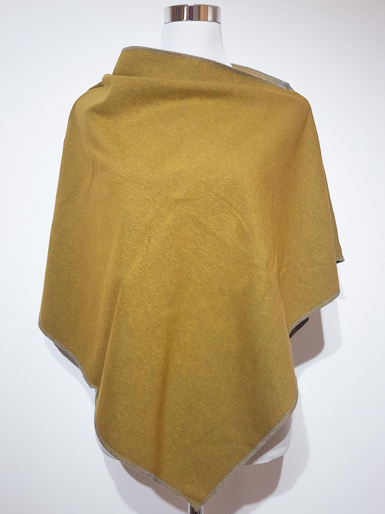Poncho Aus Wintersweat in Senfgelb Uni Poncho Aus Wintersweat in Senfgelb Uni von SchenkenoderBehalten