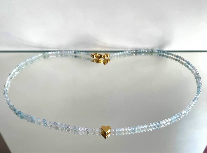 Aquamarin in Zart Hellblauer Farbe, Zierliche Kette Aus Perlen 2mm Mit Funkelnden Facetten Und Kleinem Goldenen Herz von SchlesierDesigns