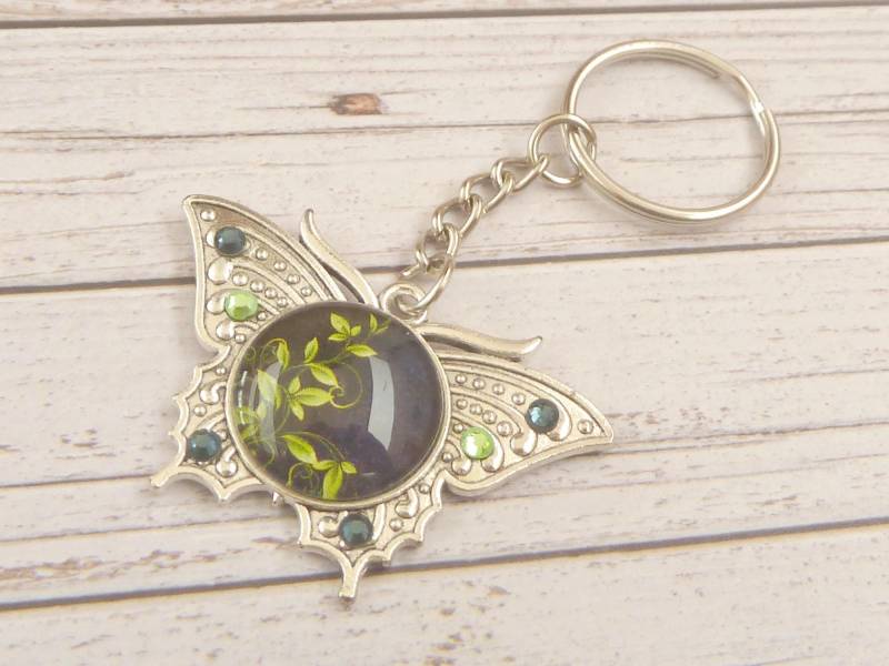 Edler Schlüsselanhänger Mit Schmetterling Ornament Und Blatt Motiv Dunkel Blau Grün Silberfarben Geschenkidee Beste Freundin von Schmucktruhe