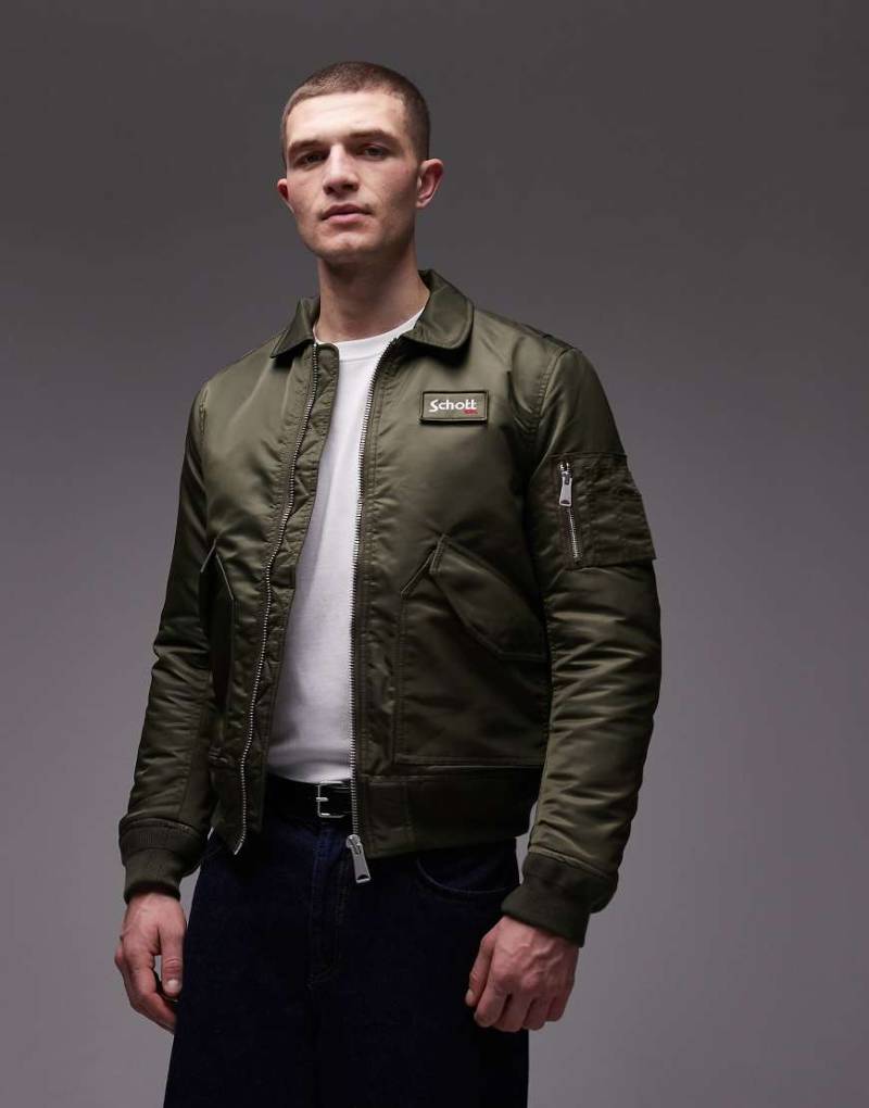 Schott - Wattierte Cropped-Jacke in Khaki mit Logo-Aufnäher und Reißverschlusstasche-Grün von Schott
