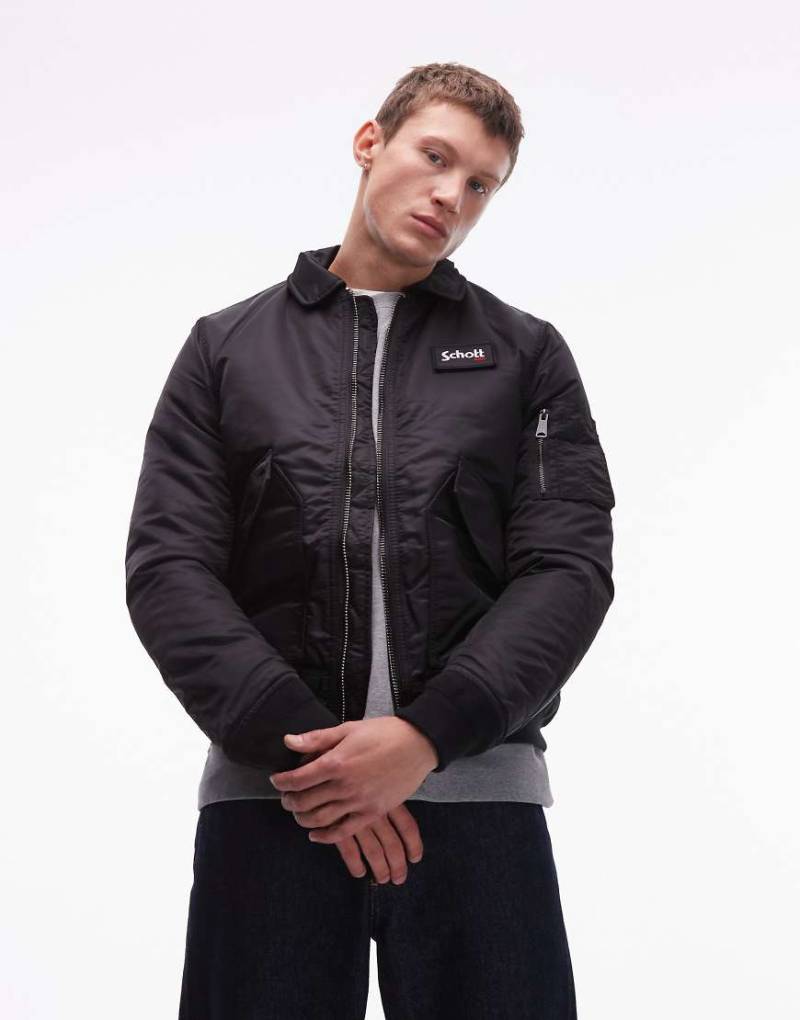 Schott - Wattierte Cropped Jacke in Schwarz mit Logo-Aufnäher und Reißverschlusstasche von Schott