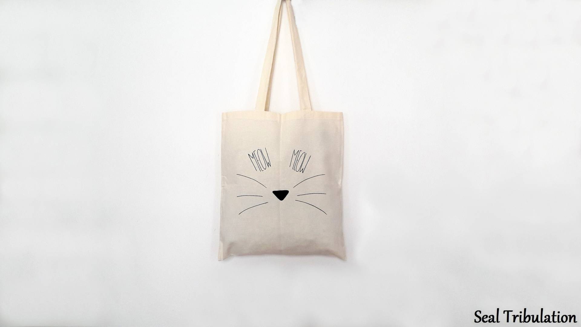 Gattu-Einkaufstasche - Bemalte Baumwolltasche Mit Katzenkopfmuster Gattu-Einkaufstasche - Bemalte Baumwolltasche Mit Katzenkopfmuster von SealTribulation