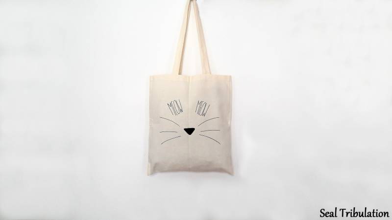 Gattu-Einkaufstasche - Bemalte Baumwolltasche Mit Katzenkopfmuster Gattu-Einkaufstasche - Bemalte Baumwolltasche Mit Katzenkopfmuster von SealTribulation