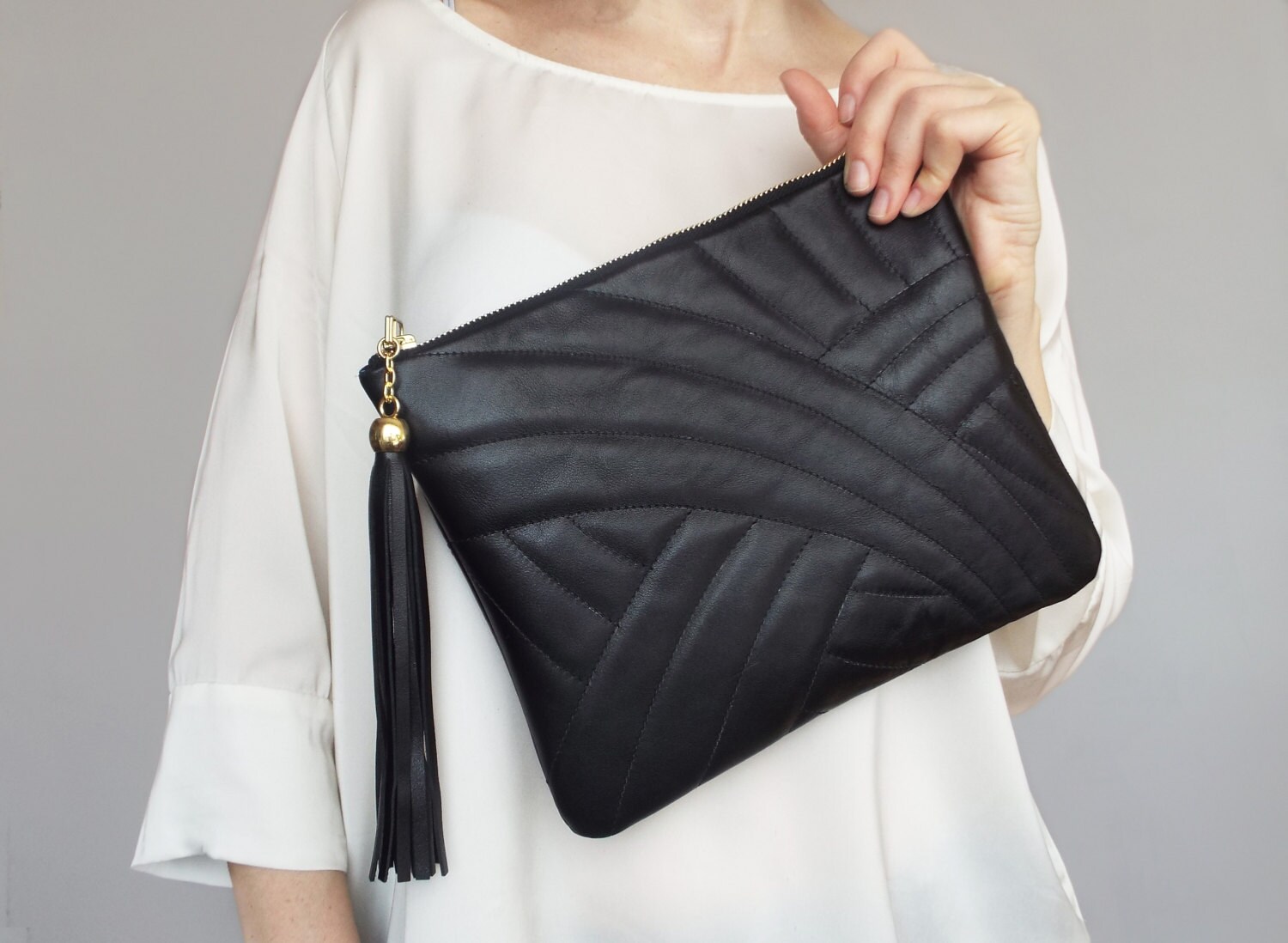 Schwarze Leder-Clutch. Leder Clutch Tasche. Abend Geldbörse. Gesteppte Leder-Clutch-Tasche Schwarze Leder-Clutch. Leder Clutch Tasche. Abend Geldbörse. Gesteppte Leder-Clutch-Tasche von Secinski