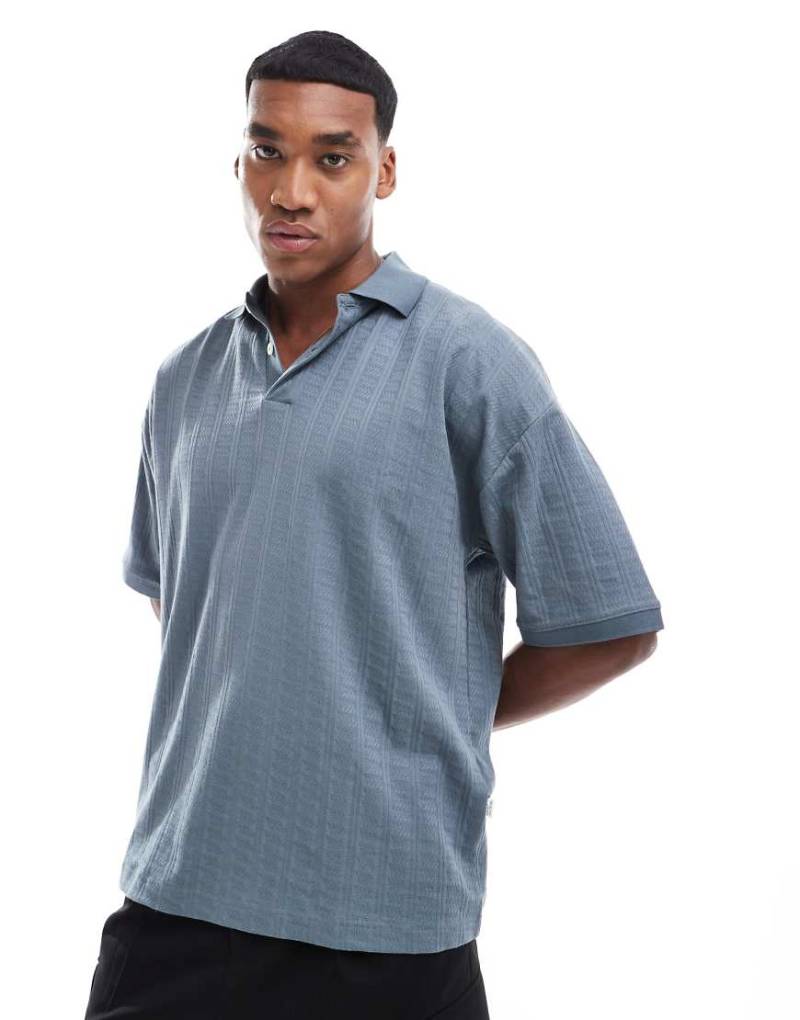 Selected - Jacquard-Polohemd mit kastigem Schnitt in Blau von Selected