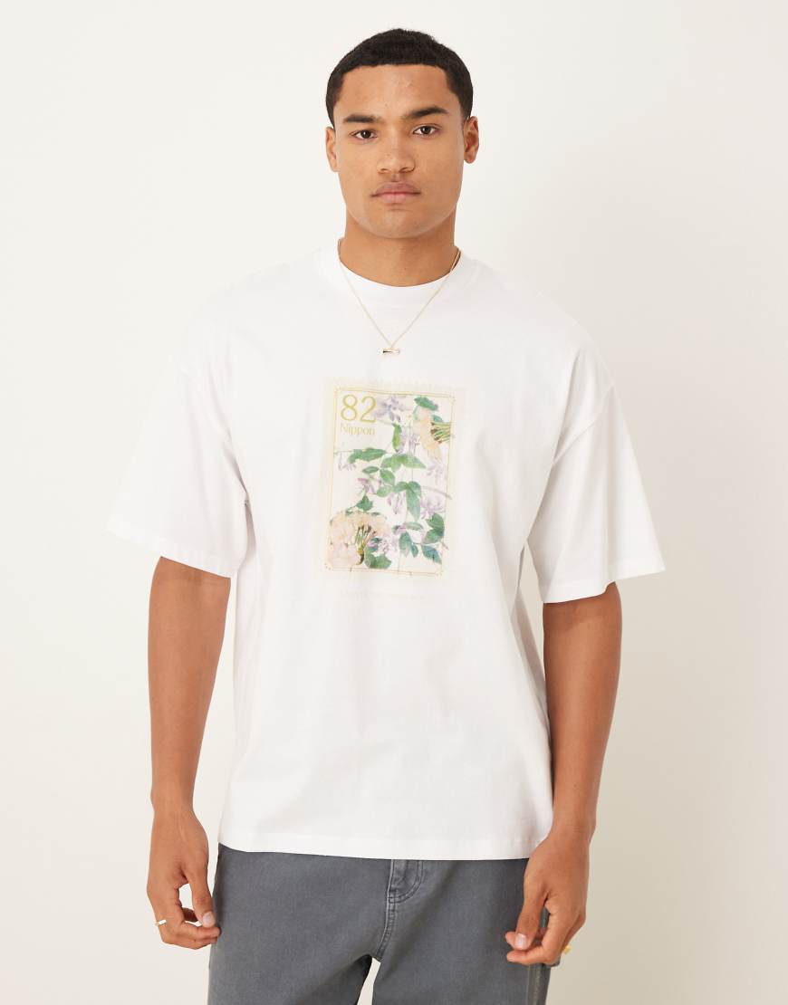 Selected Homme - Oversize-T-Shirt in Weiß mit Blumen-Print auf der Vorderseite Selected Homme - Oversize-T-Shirt in Weiß mit Blumen-Print auf der Vorderseite von Selected Homme