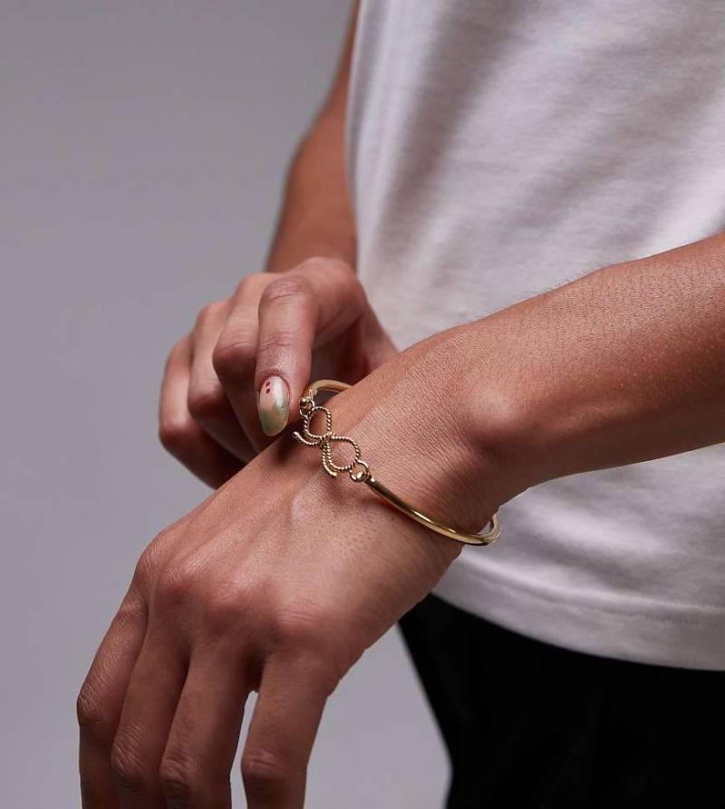 Seol + Gold - Armreif aus 18-karätigem Gold-Vermeil mit Schleifen-Detail-Goldfarben von Seol + Gold