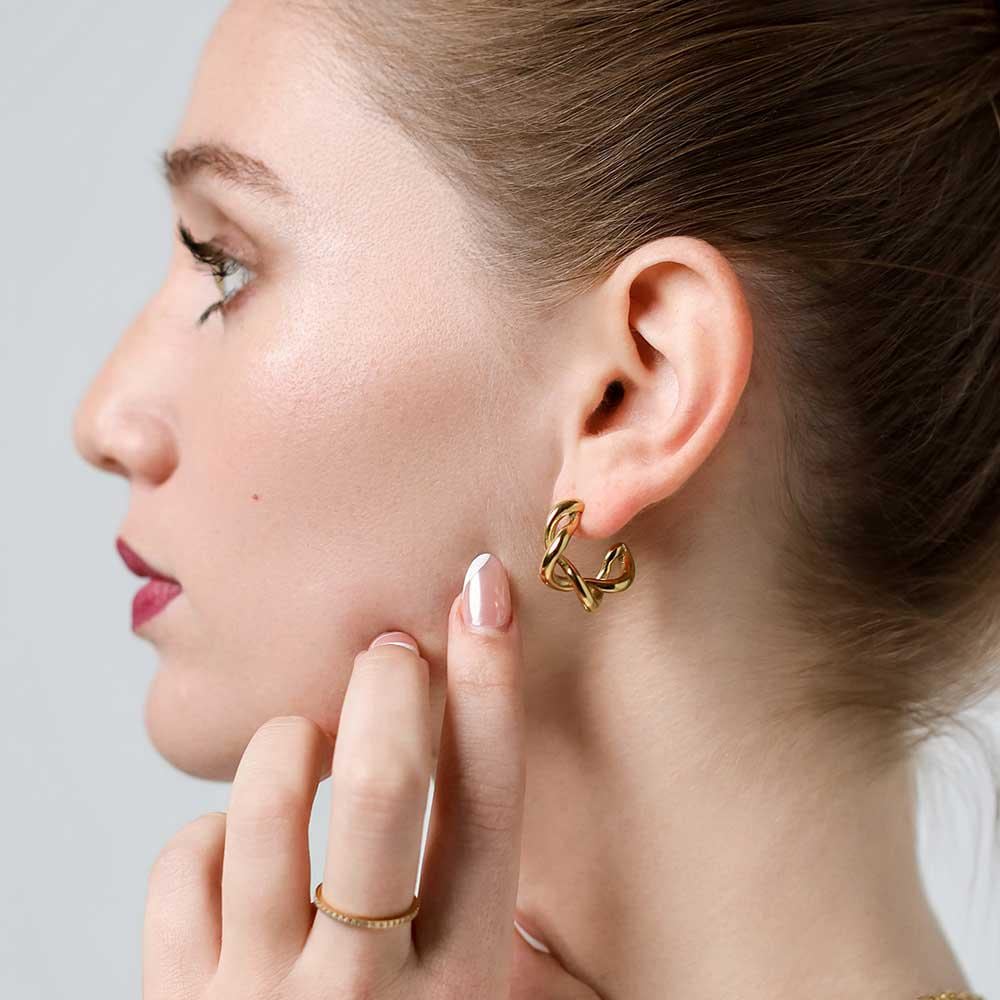 Gedrehte, Chunky Damen Edelstahlcreolen in Zwei Farben von SergioEngeljewelry