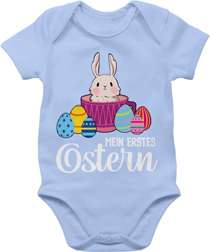 Baby Body Junge Mädchen - Ostergeschenke - Mein erstes Ostern Hase in Tasse I Osterhase I My first easter - 12/18 Monate - Babyblau - osteroutfit osterkleidung ostermotiv 1 babykleidung outfit von Shirtracer
