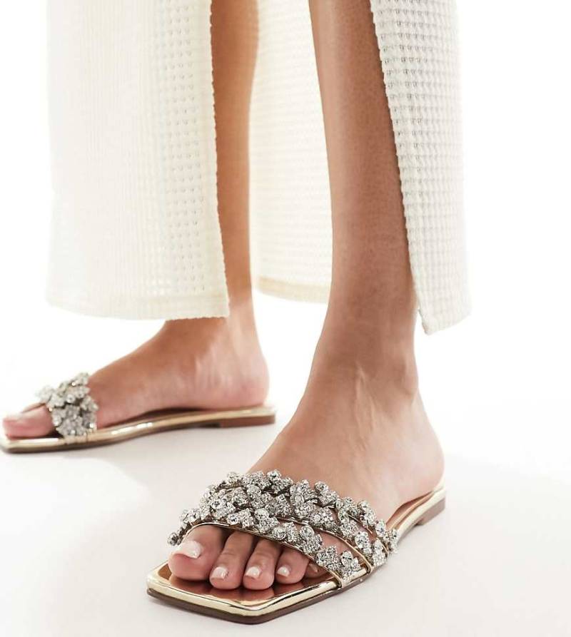 SIMMI London Wide Fit - Capri - Verzierte, goldfarbene flache Sandalen, weite Passform von Simmi Wide Fit