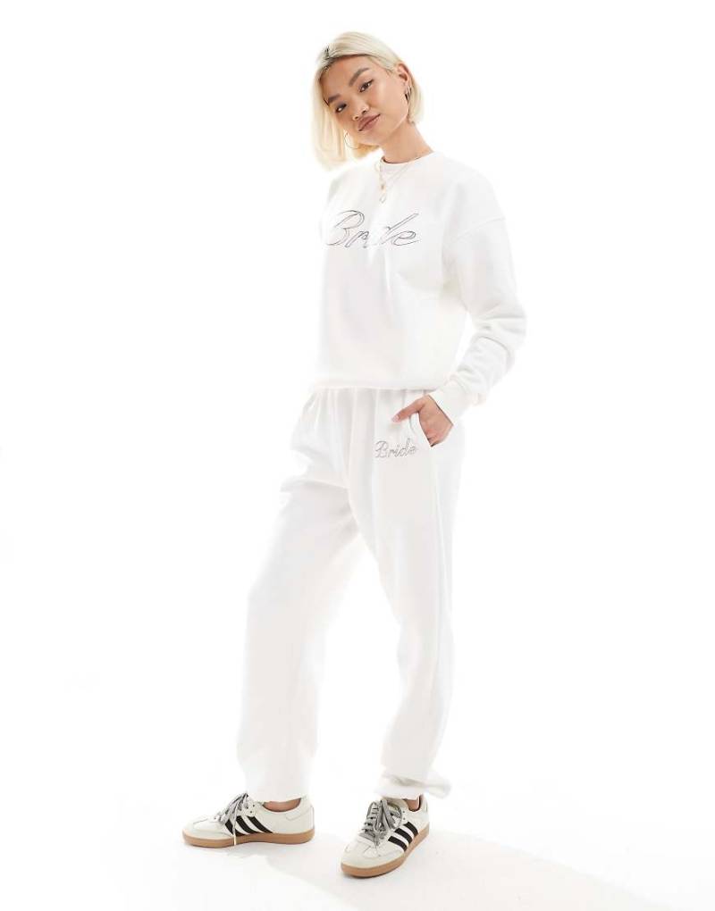 Six Stories - Bride - Jogginghose in Elfenbeinweiß mit „Bride"-Schriftzug, Kombiteil von Six Stories
