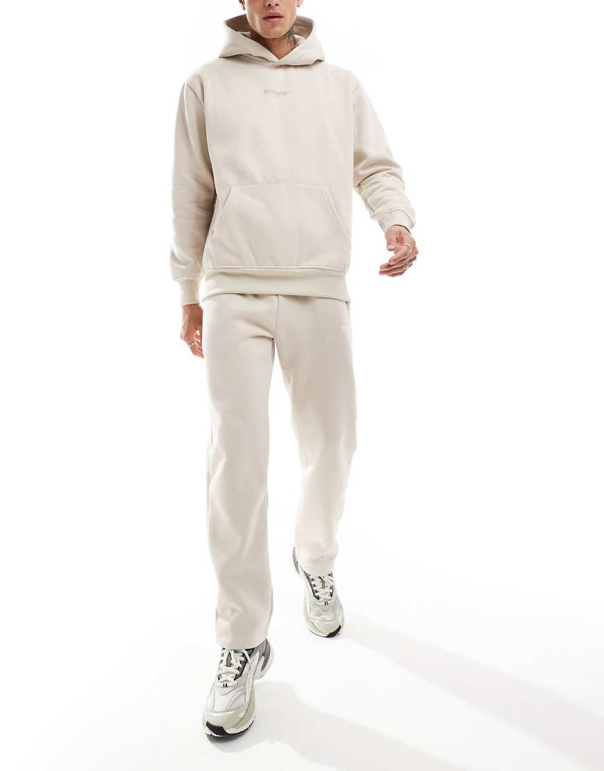 Sixth June - Gerade geschnittene Jogginghose in Beige mit Motivprint, Kombiteil-Neutral Sixth June - Gerade geschnittene Jogginghose in Beige mit Motivprint, Kombiteil-Neutral von Sixth June