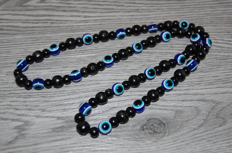 Blau Evil Eye Halskette, Schwarze Holzperlen, Holz Hamsa Männer, Beten, Spiritualität, Meditation, Yoga, Schutz, Halskette Blau Evil Eye Halskette, Schwarze Holzperlen, Holz Hamsa Männer, Beten, Spiritualität, Meditation, Yoga, Schutz, Halskette von SkywaterStudio