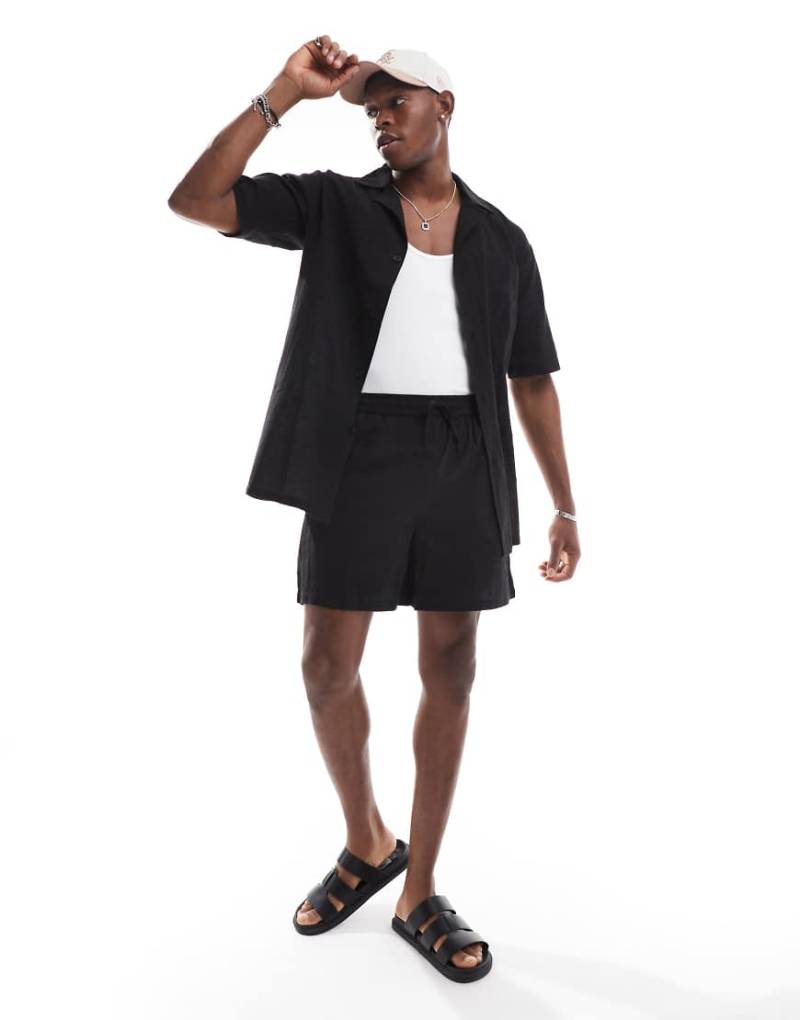 Sol Beach - Strukturierte Strand-Shorts in Schwarz mit Kordelzug von Sol Beach