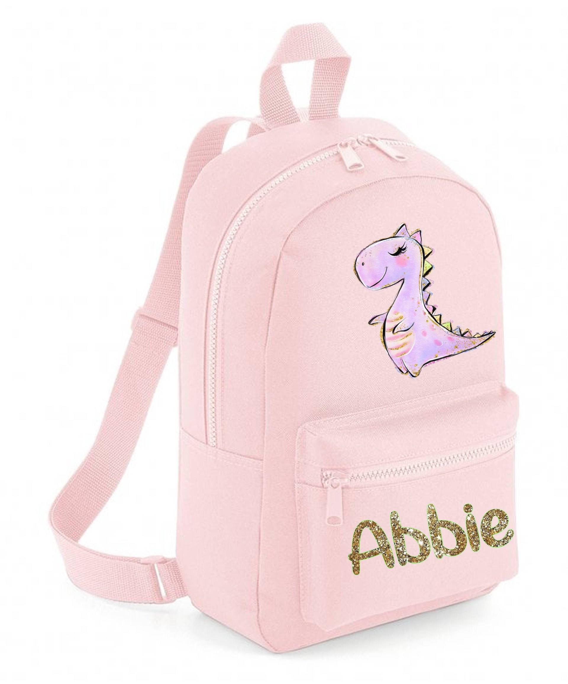 Personalisierter Rucksack Schultasche Mädchen Dinosaurier Mit Schleife Design, Beliebiger Name, Farbwahl, 110 von SonnyAndKitGifts