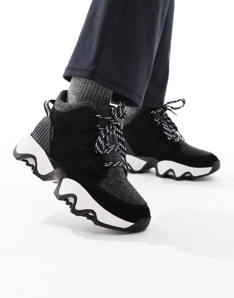 Sorel - Kinetic Impact Caribou Plus- Wanderschuhe in Schwarz und Cremeweiß Sorel - Kinetic Impact Caribou Plus- Wanderschuhe in Schwarz und Cremeweiß von Sorel