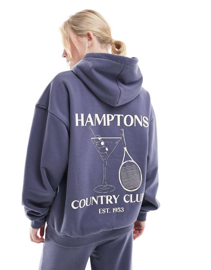 South Beach - Hampton - Kapuzenpullover in Blau mit „Hamptons"-Rückengrafik von South Beach