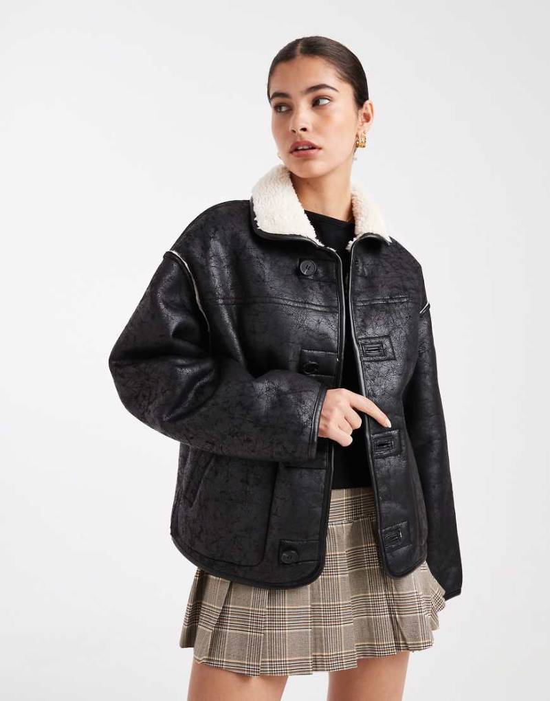 South Beach - Ladies - Wendbare Jacke mit Teddyfell und Kunstleder in Schwarz und Weiß sowie Knopfleiste-Bunt von South Beach