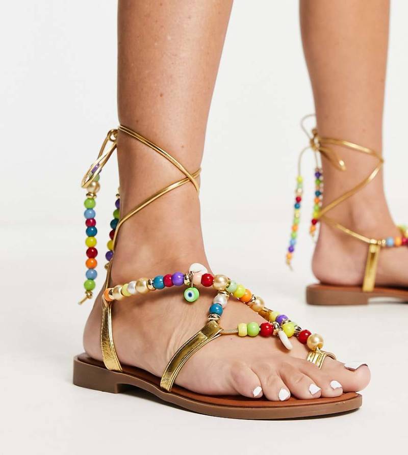 South Beach - Sandalen in Gold mit buntem Perlenbesatz von South Beach