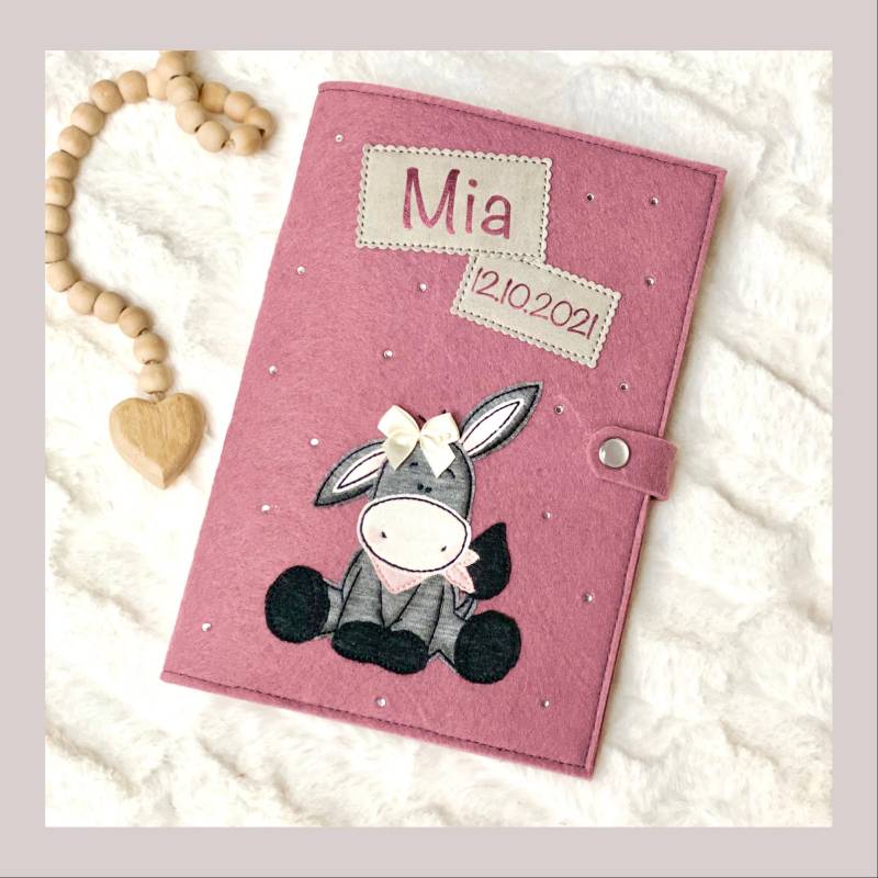U-Hefthülle Esel - Geschenk Zur Geburt U-Heft Hülle Mädchen Mit Strass Personalisierung Wunschtext Verschiedene Farben Erhältlich von Spatzbaer