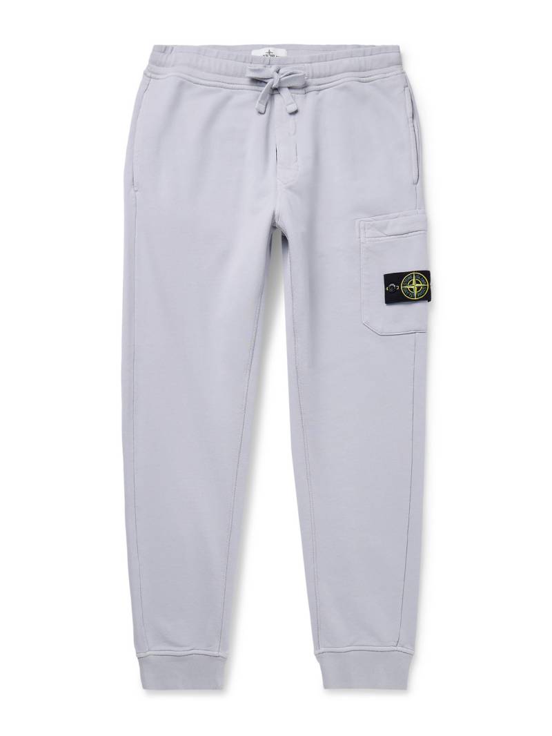 Stone Island - Tapered Logo-Appliquéd Garment-Dyed Cotton-Jersey Sweatpants - Men - Gray - M von Stone Island