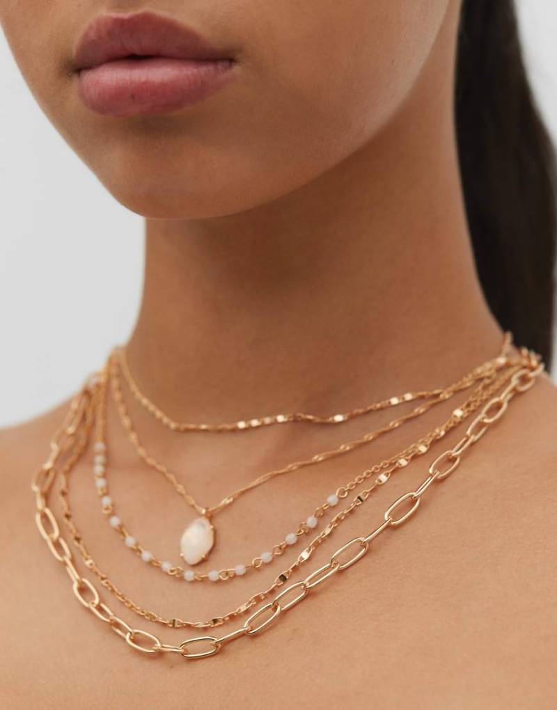 Stradivarius - 5er-Pack goldfarbene Halsketten mit rosa Zierstein-Gelb von Stradivarius