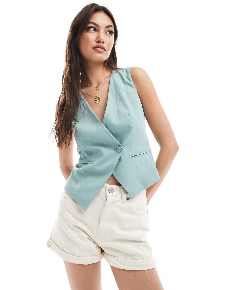 Stradivarius - Asymmetrische Weste in Blaugrün-Neutral Stradivarius - Asymmetrische Weste in Blaugrün-Neutral von Stradivarius